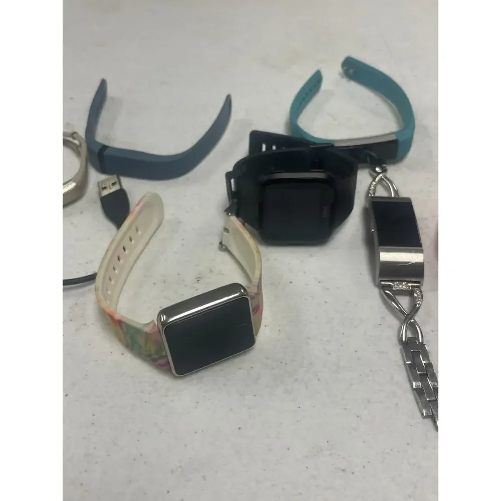 Lot of 7 Fitbit Mixed Brands Activity Tracker Smart Watches Untested For Parts
